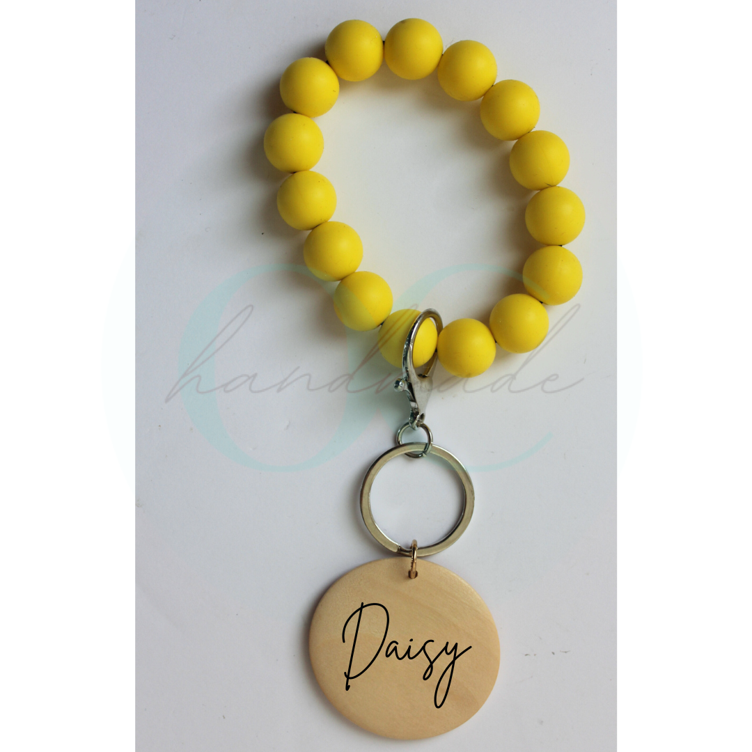 Daisy Yellow Engraved Wristlet