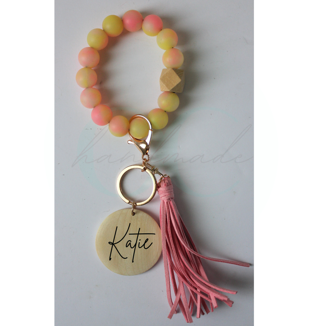 Glow Yellow and Pink Engraved Wristlet